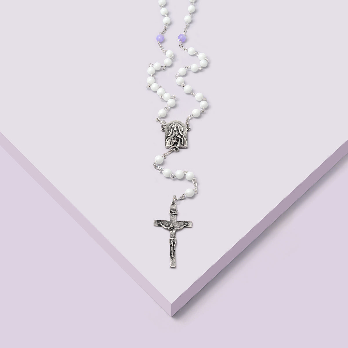 Close-up of Crucifix inspired by Matthew 11:28, with artistic detail and antique silver finish.