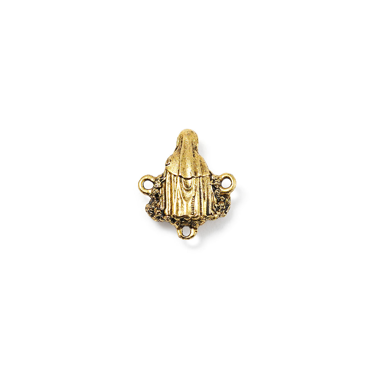 Gold-colored religious pendant on a white background