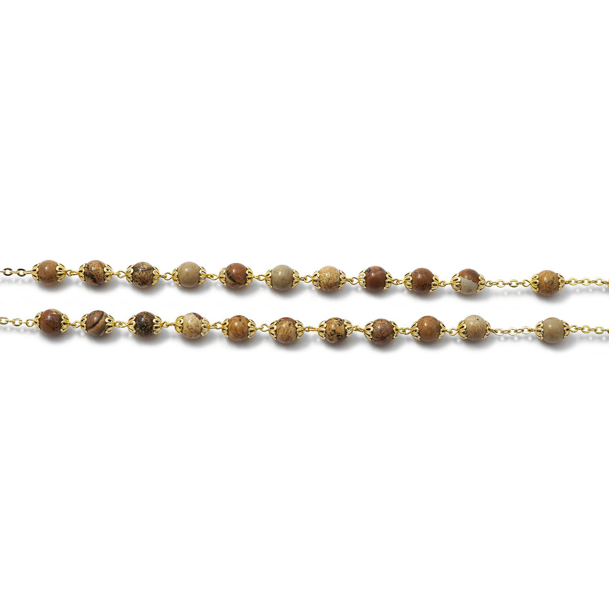 Gold chain with brown beads on a white background