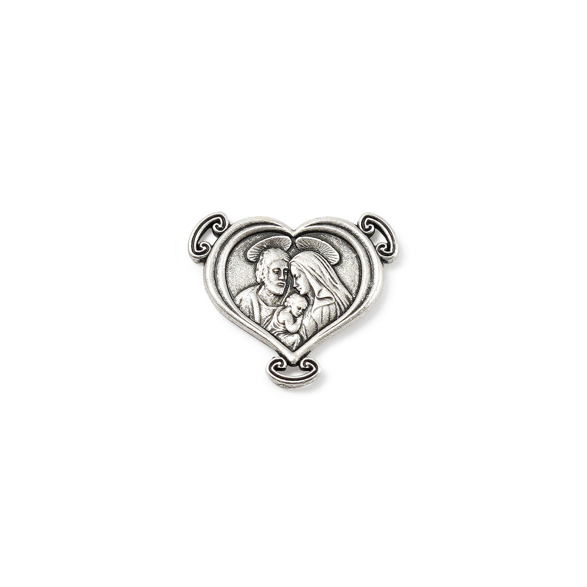 Heart-shaped silver pendant with religious design on a white background