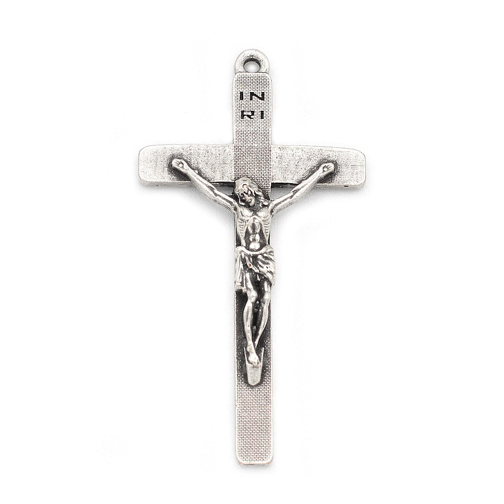 Antique silver crucifix with Christ corpus and tapered edges