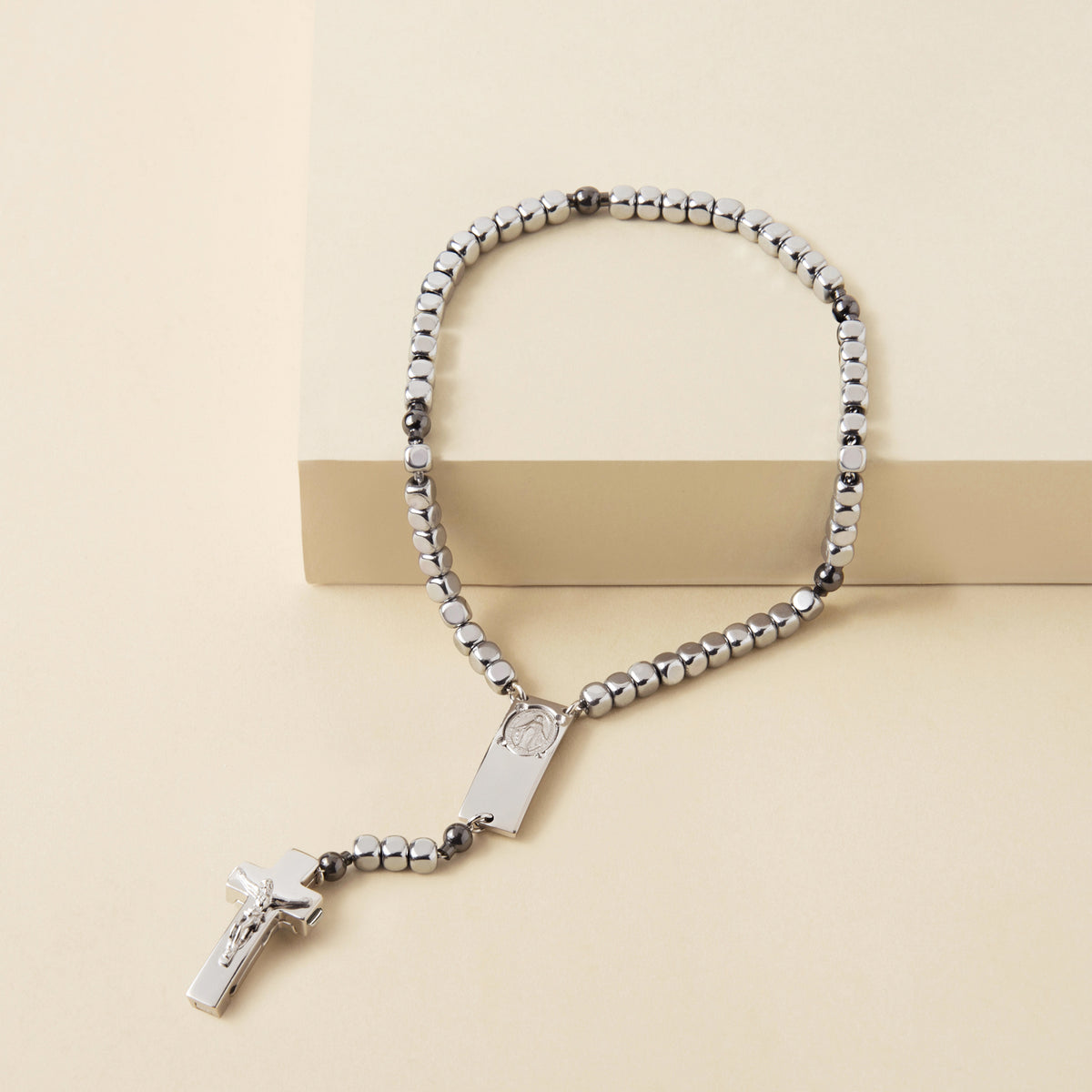 Square rhodium-plated beads on traditional Rosalet bracelet
