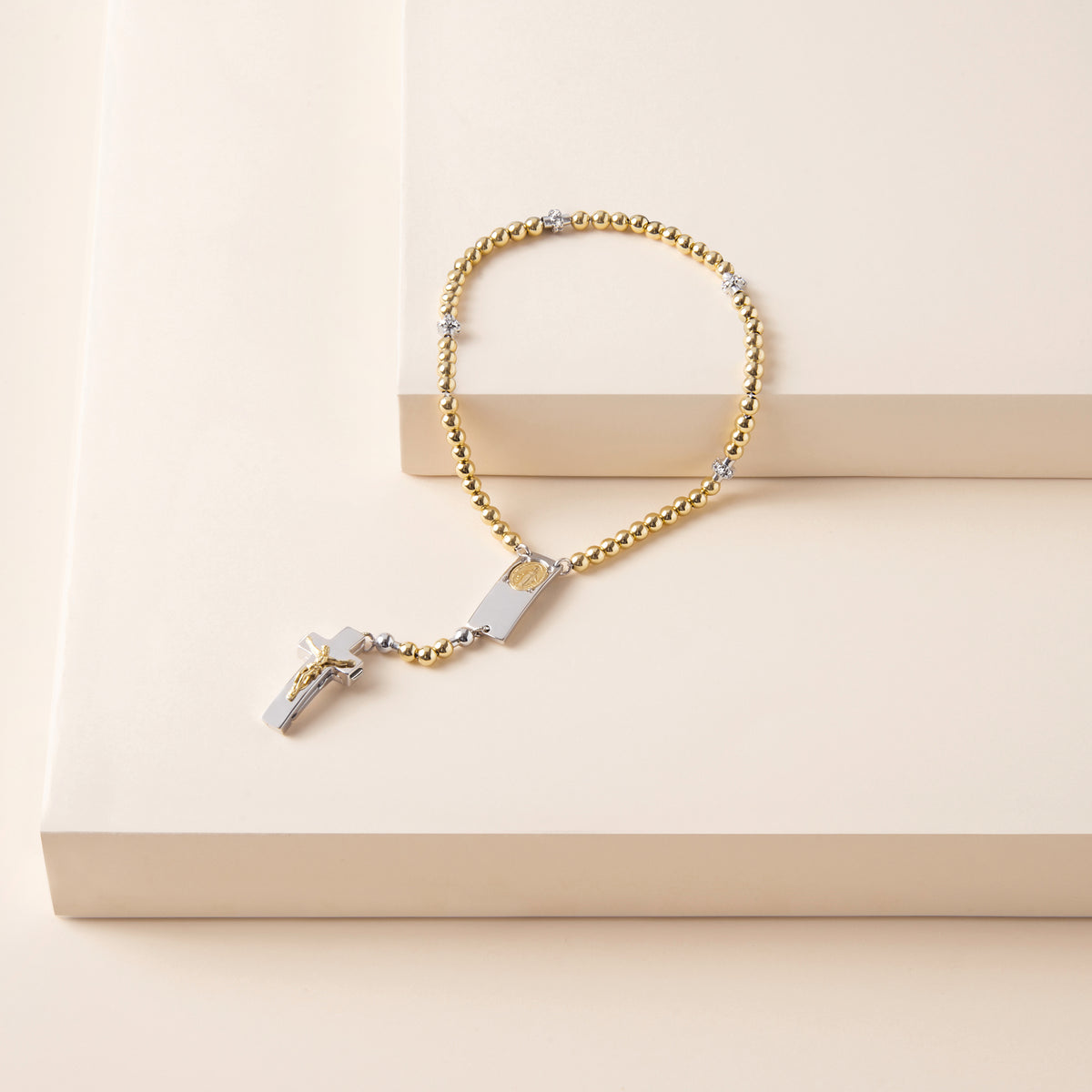 Sterling silver Rosalet with gold-plated crucifix clasp design