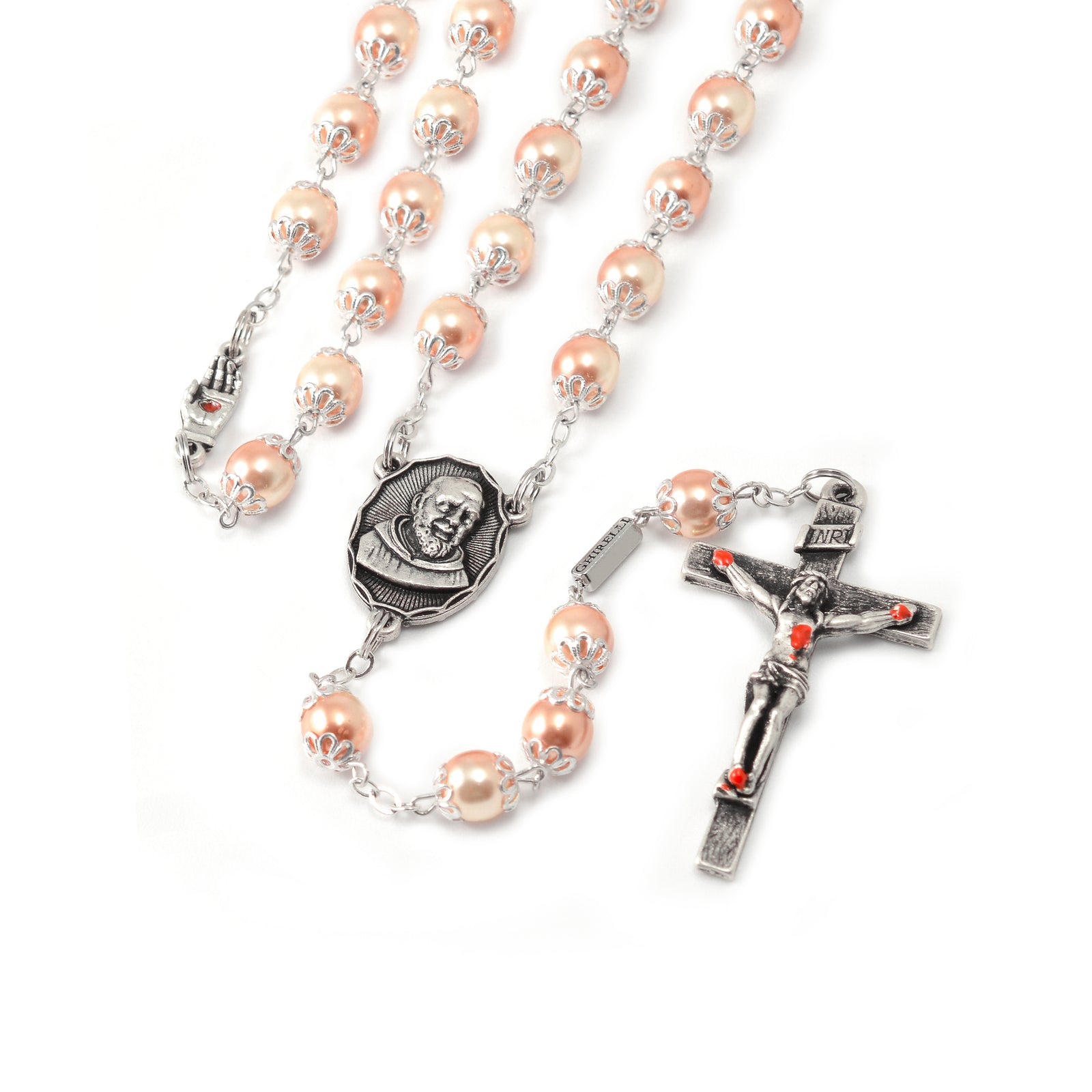 A rosary with pink pearl beads and antique silver caps, featuring an image of Saint Pio on the centerpiece and a special crucifix with red hand-enameled wounds.
