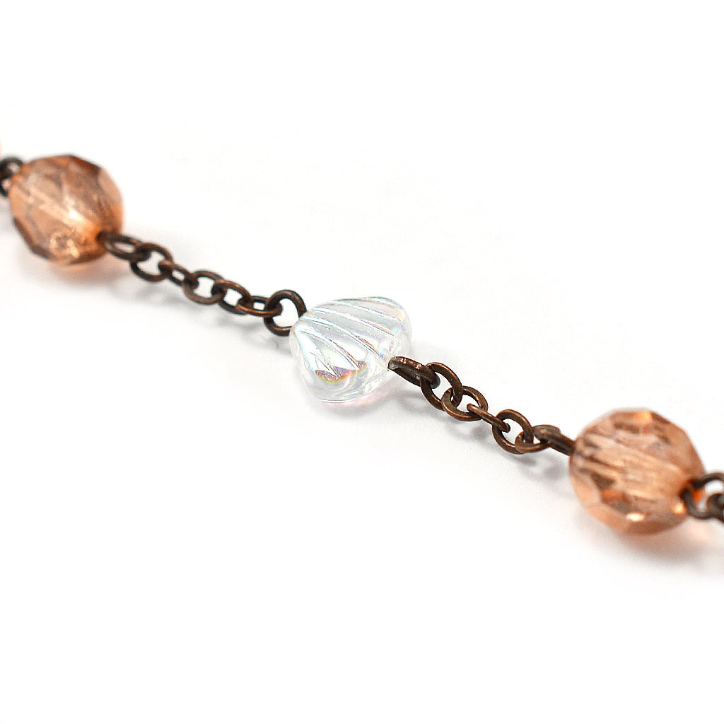 Handmade rosary from Italy with copper crystal reflections